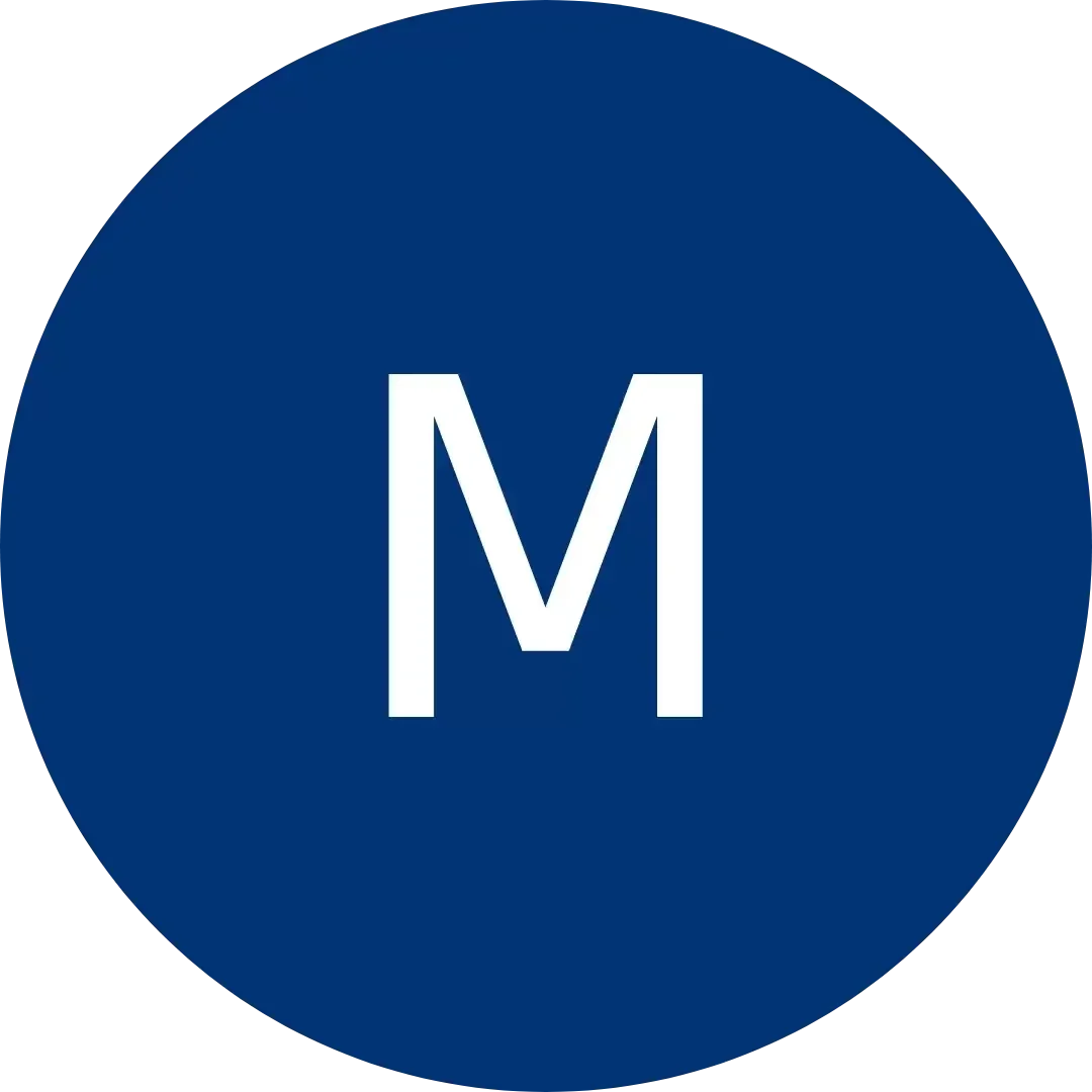 White letter M centered within a dark blue circular icon.